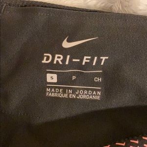 Small pink and grey Nike leggings